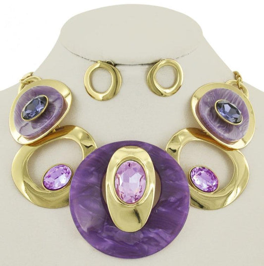 purple and gold necklace with purple diamonds. comes with gold earings