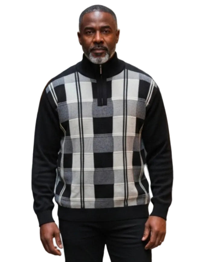Man wearing a checkered sweater and black pants.