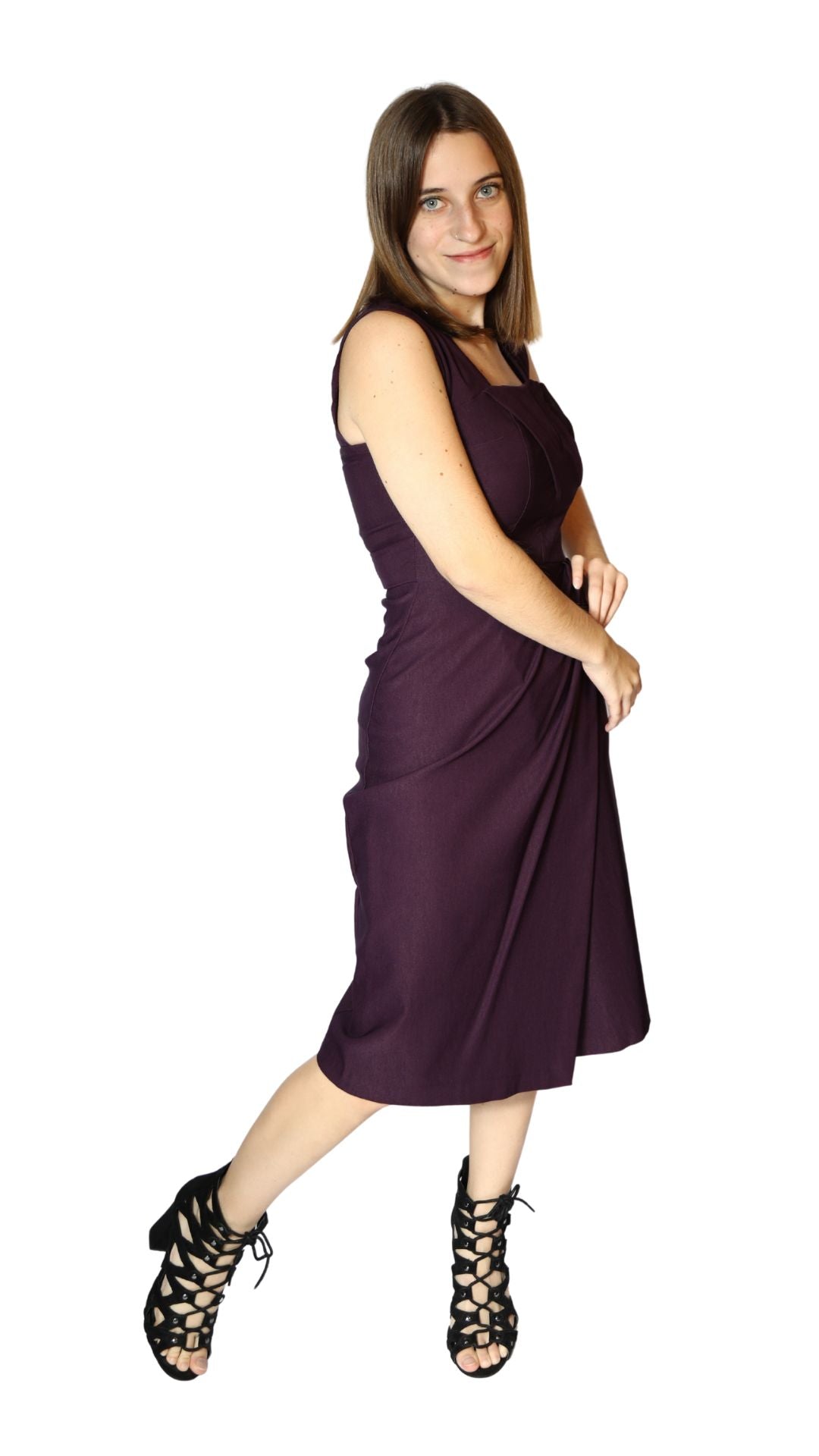 Woman wearing a purple dress on a white background