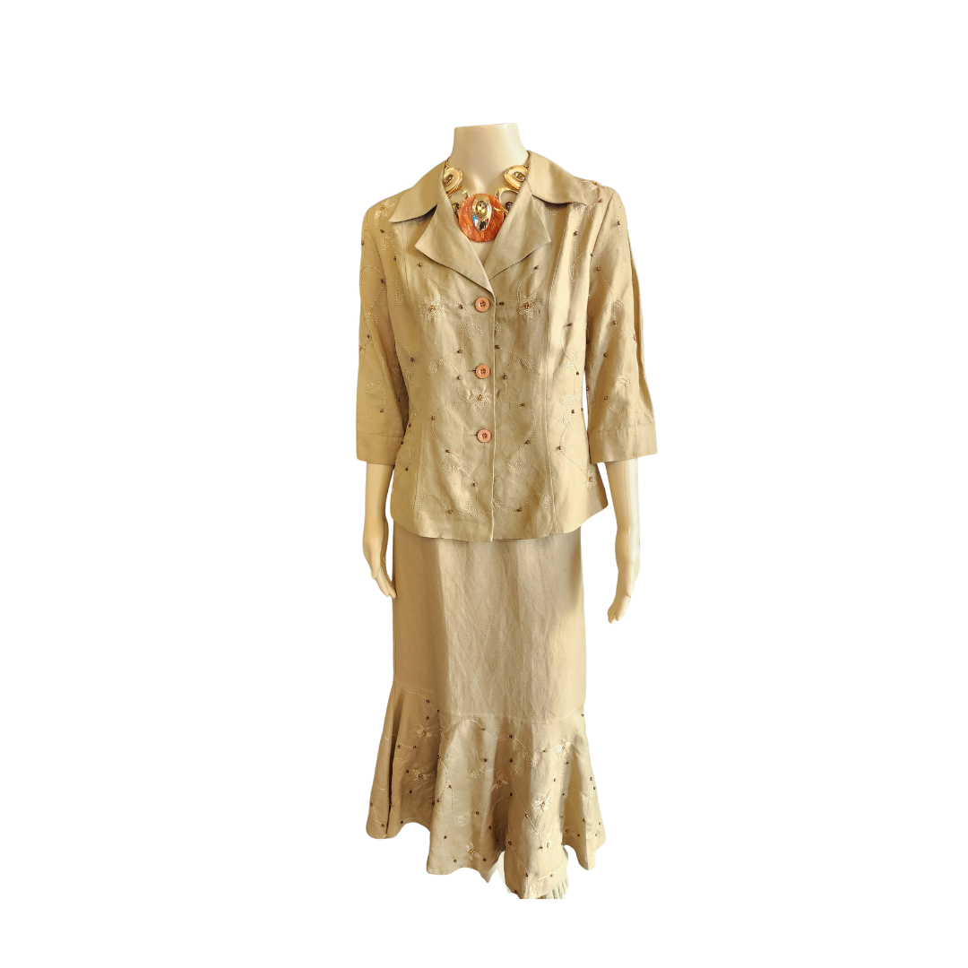Beige dress on a mannequin with a white background