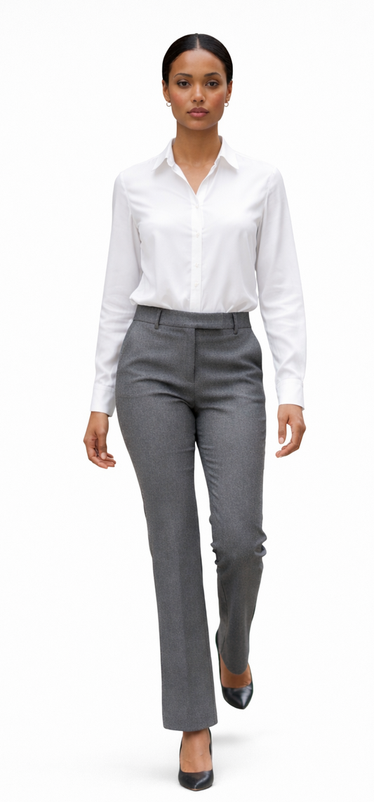 Woman wearing a white shirt and gray pants on a white background