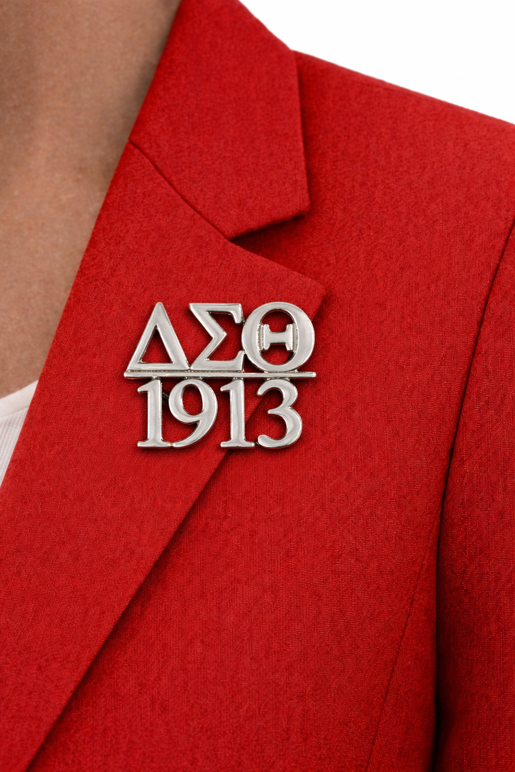 Red blazer with a silver Delta Sigma Theta sorority pin on a white background