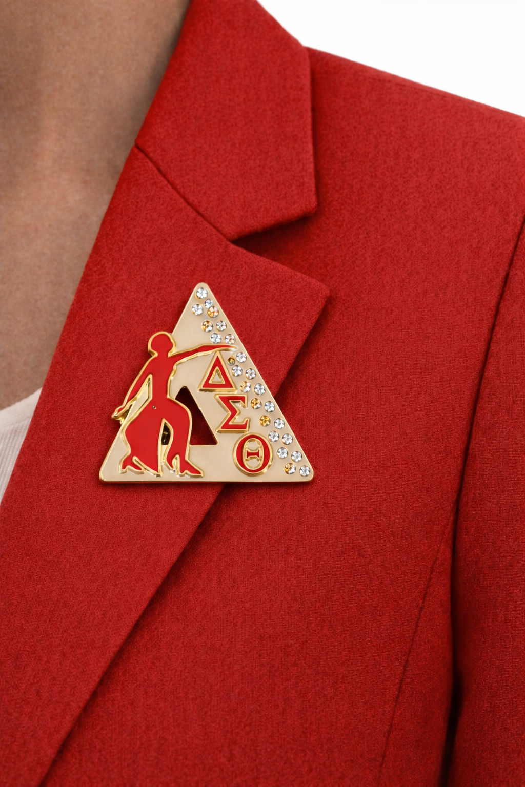 Red blazer with a Delta Sigma Theta pin on a white background