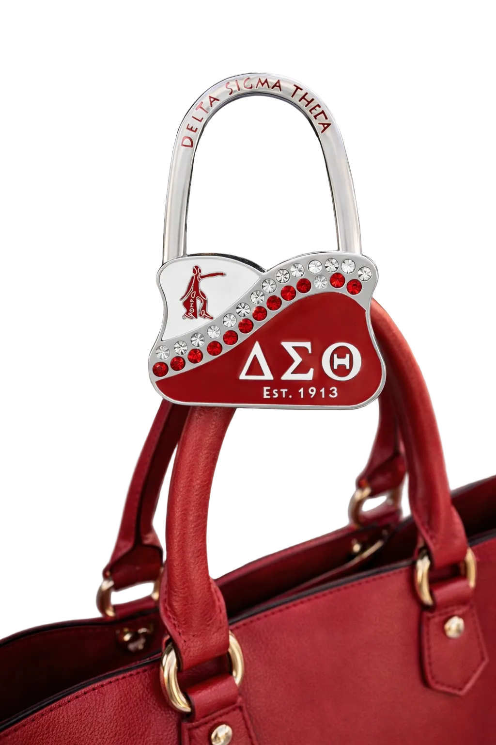 Red bag with a Delta Sigma Theta branded purse hanger attached, featuring a red heart design.