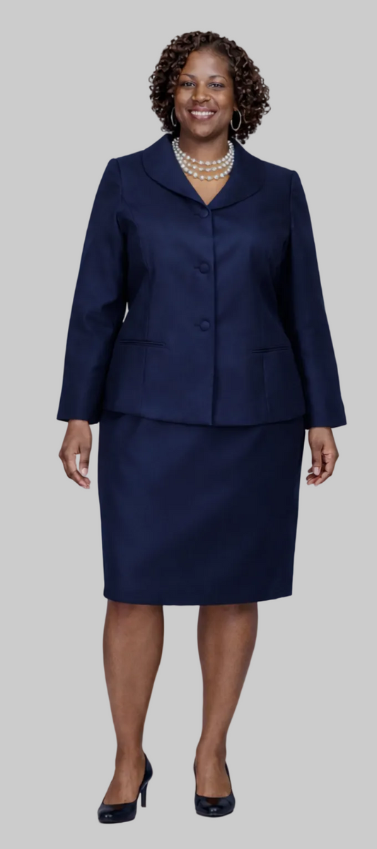 Woman wearing a navy blue suit on a light gray background