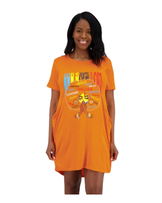 Woman wearing an orange t-shirt dress with a graphic design on a white background