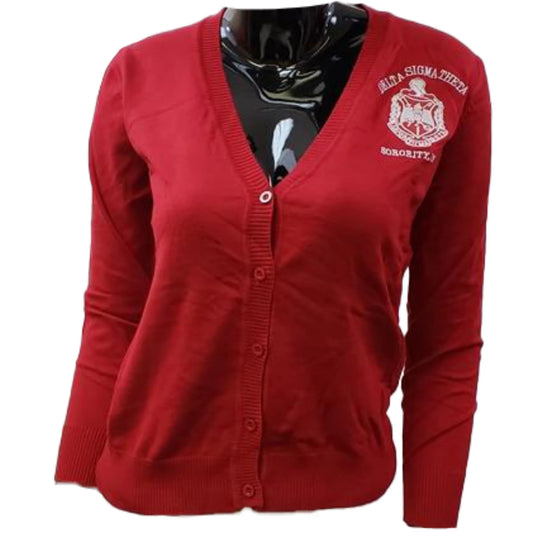 Red cardigan with Delta Sigma Theta Crest on left breast against a white background