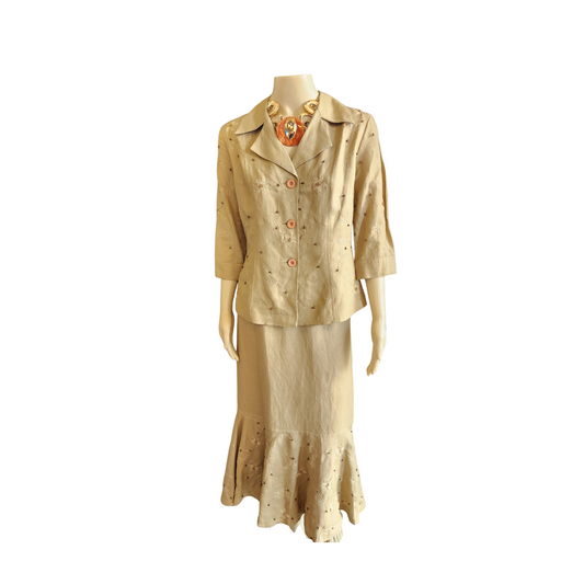 Beige dress on a mannequin with a white background