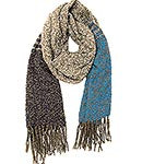 A two-tone bouclé shawl with fringe, featuring a generous size with a mix of dark and light bouclé fabric, draped and displayed on a white background.