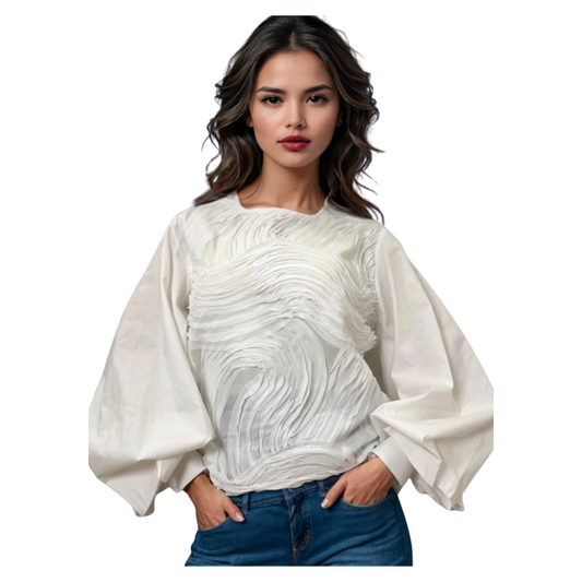 Woman wearing a white blouse with a textured pattern on a white background