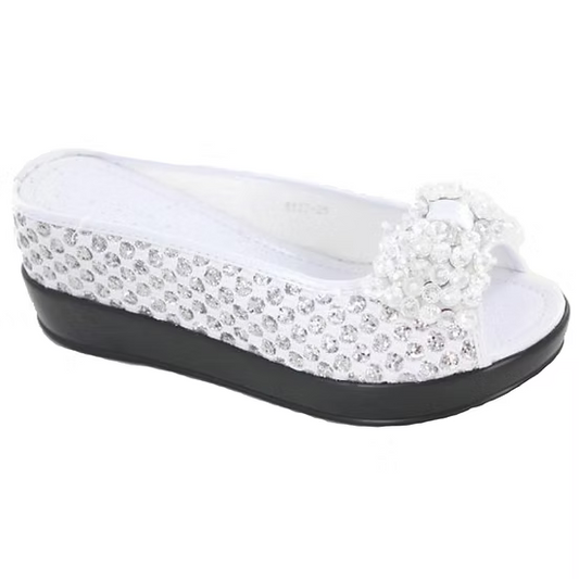 White sandal with rhinestone embellishments on a white background