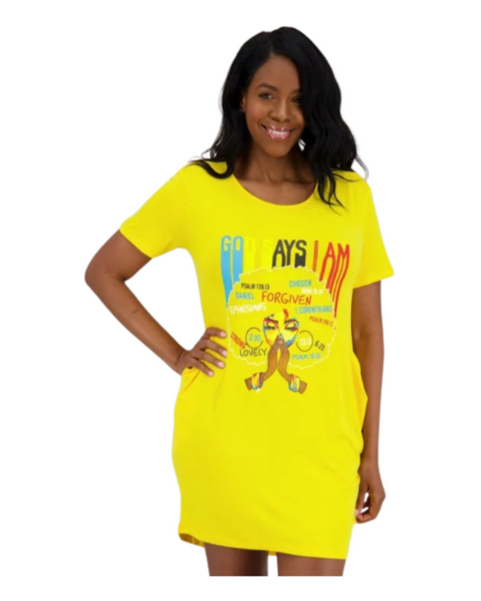 Woman wearing a yellow t-shirt dress with graphic design on a white background