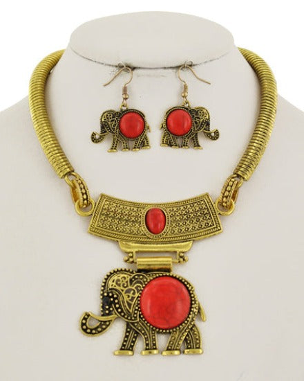 gold and red metal pendant necklace and earring set 
