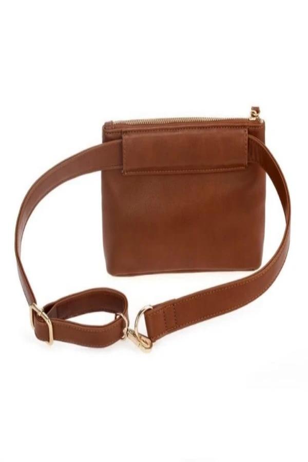 Brown Belt Pack leather  side pocket . Inside enclosure a small zipper pocket